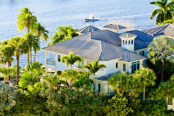 Aerial view of beautiful waterfront home in Naples, FL